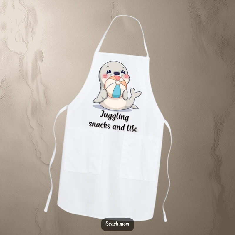 Funny apron design showing a seal balancing a beach ball, ideal for cooking and kitchen fun.