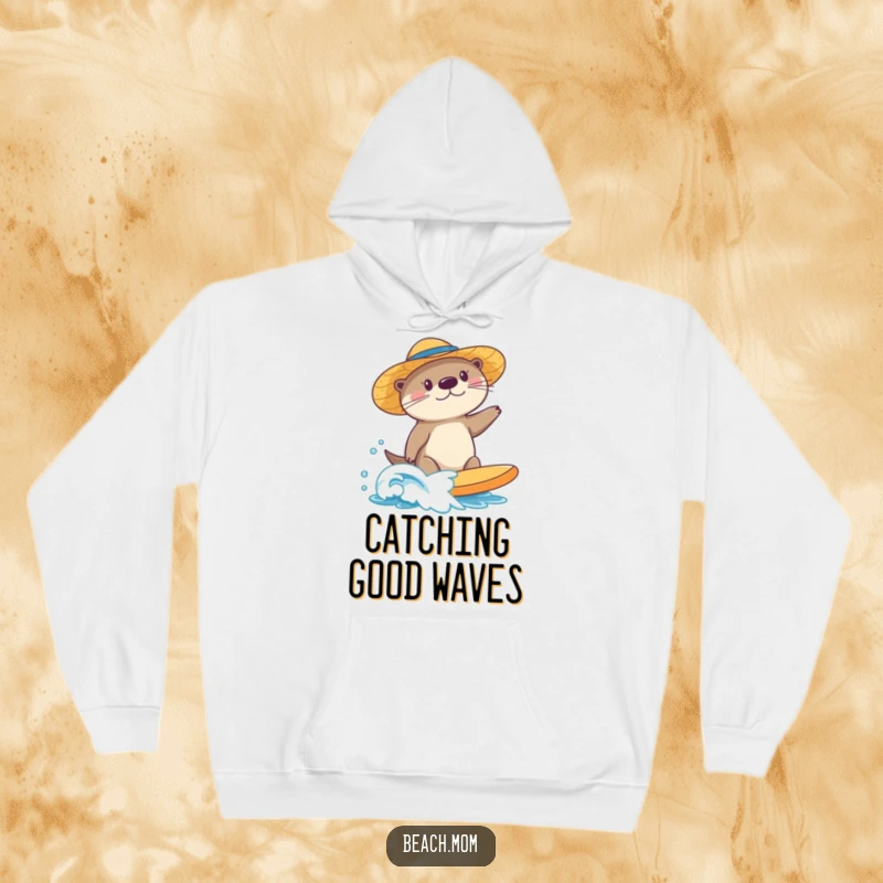 Funny sea otter hoodie, wearing a sun hat, surfing a small wave, perfect for cozying up with a dose of beachy humor.