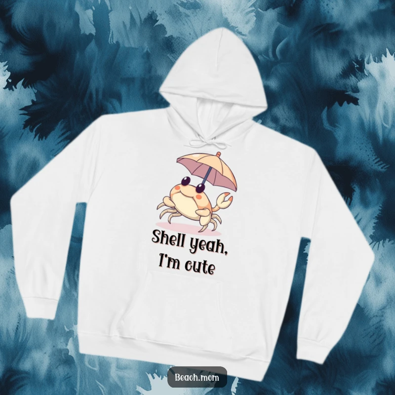 Funny hoodie with a cheerful crab scuttling sideways under a tiny umbrella, offering warmth and humor.