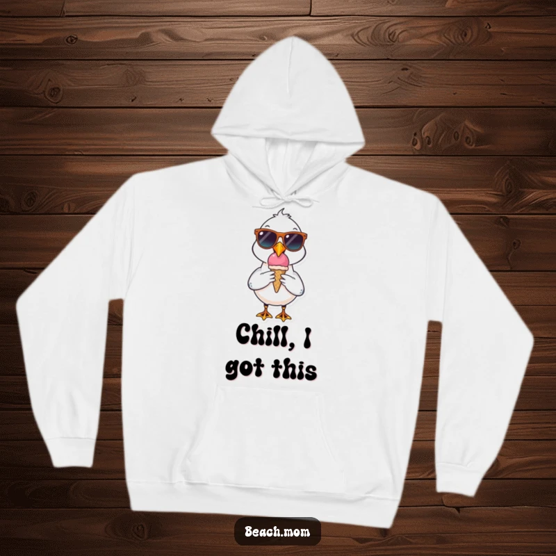 Funny seagull character hoodie wearing sunglasses, holding an ice cream cone, offering cool comfort and beachy humor.