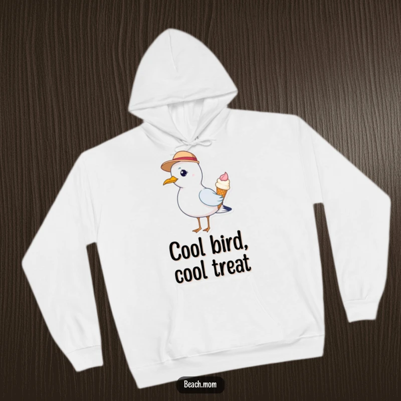 Funny hoodie depicting a dapper seagull in a hat, enjoying an ice cream cone, blending warmth with wit.