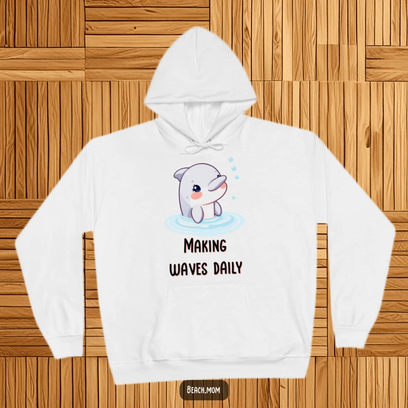 Funny dolphin peeking out of water, blowing bubbles, depicted on a warm and comfortable hoodie.