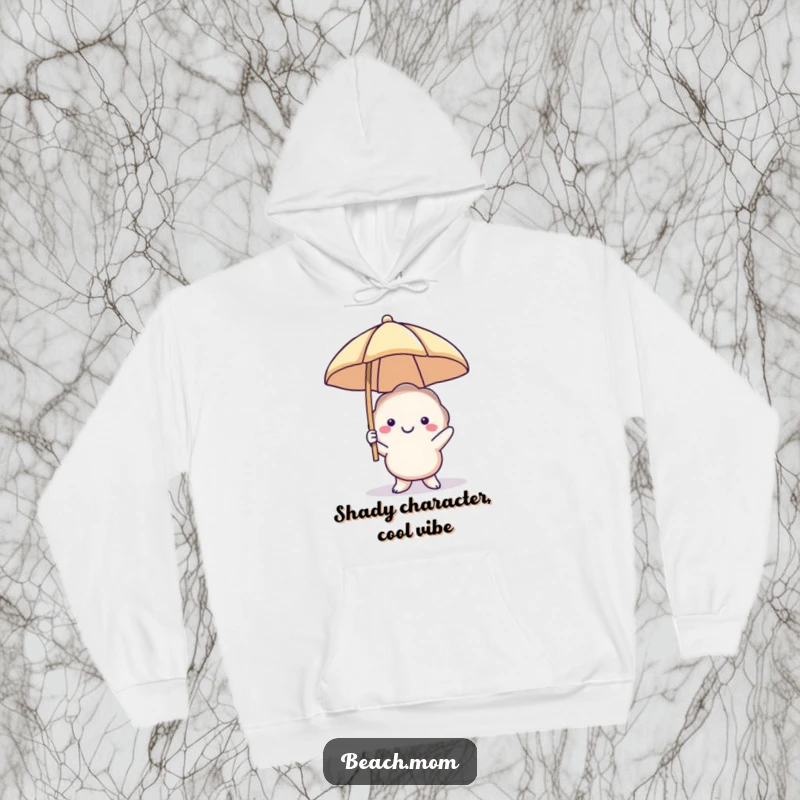Funny seashell hoodie featuring a smiling character with a beach umbrella, offering warmth and seaside humor, a perfect gift for beach lovers.
