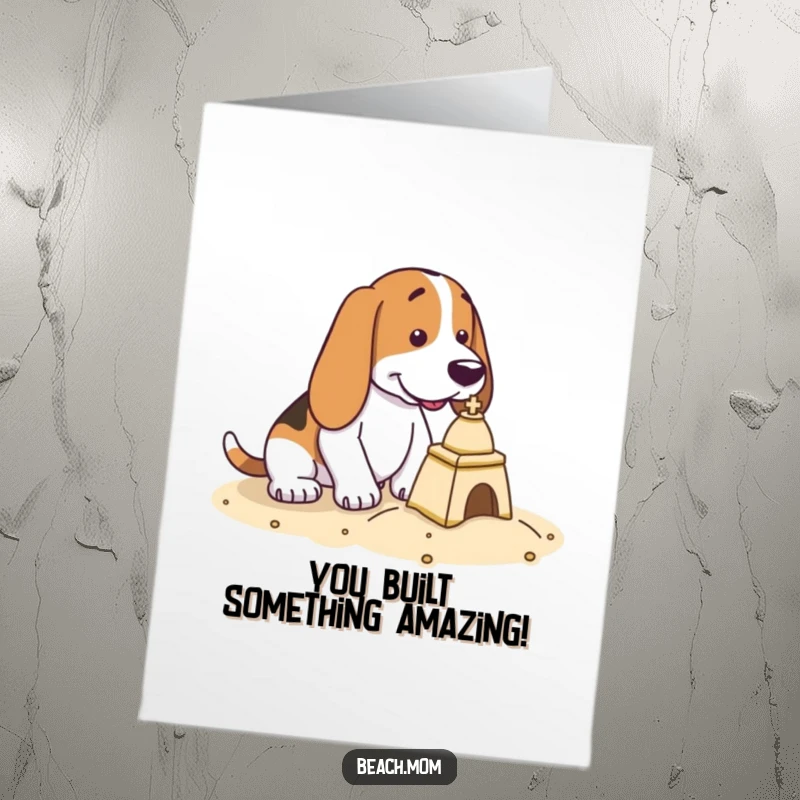 Free Printable Congratulations Card: A Basset Hound shows intense focus while building a tiny sandcastle.