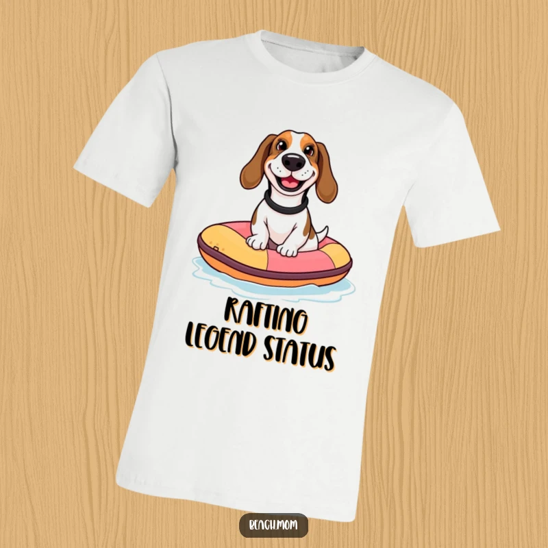 Funny Basset Hound t-shirt depicting a dog with a goofy grin on a tiny inflatable raft, capturing a humorous water adventure.