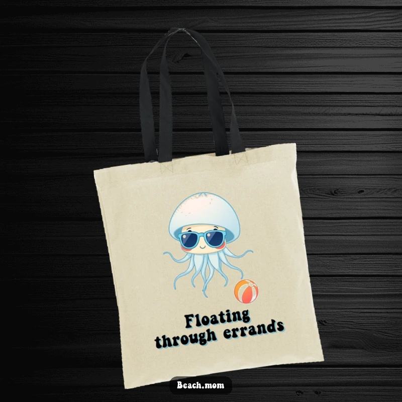 Funny Jellyfish Shades Tote Bag: A durable tote showing a jellyfish in sunglasses near a beach ball, ideal for funny beach trips.